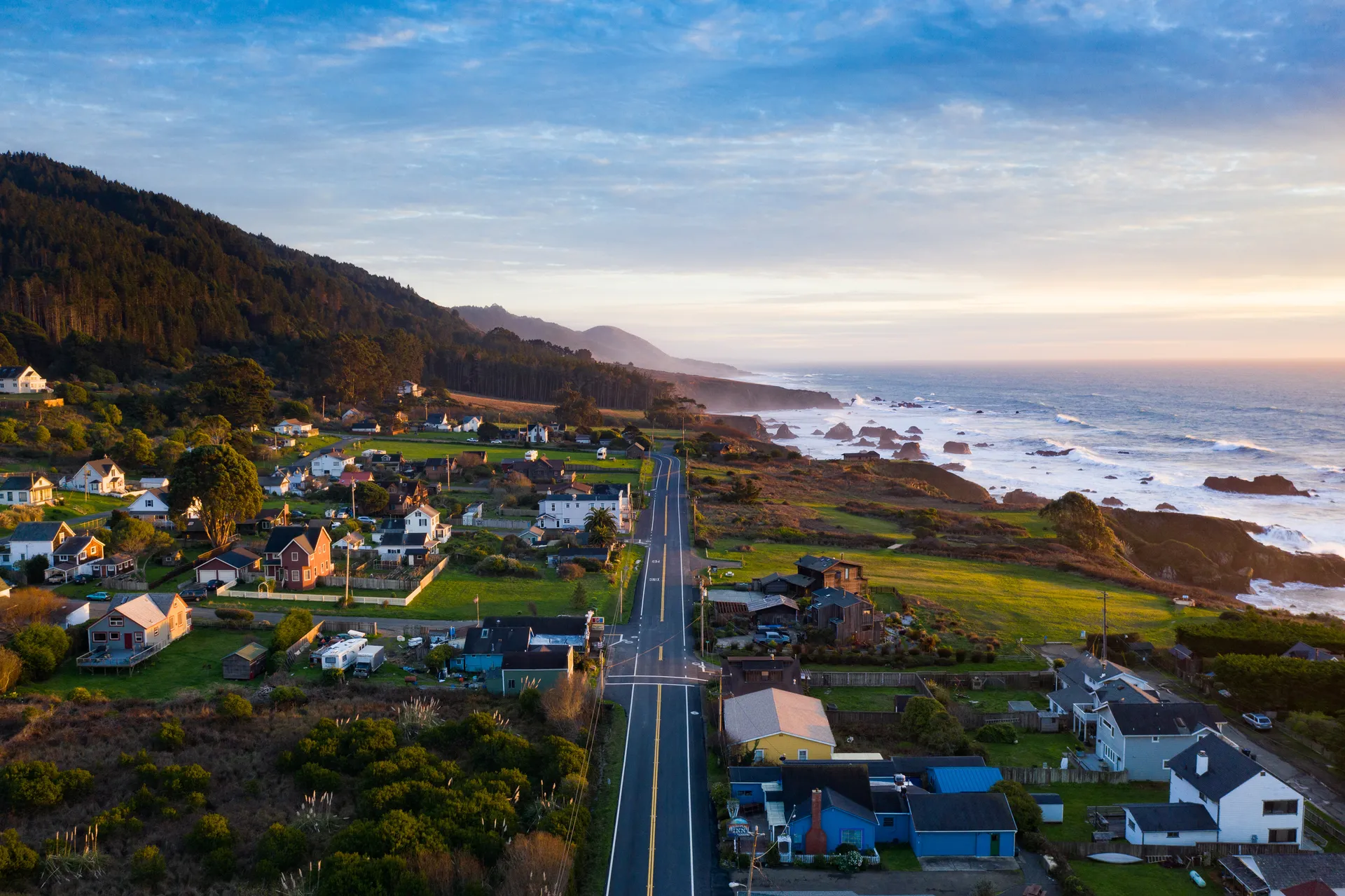 Aerial view of Westport strung along Highway 1 on the Mendocino Coast at sunset